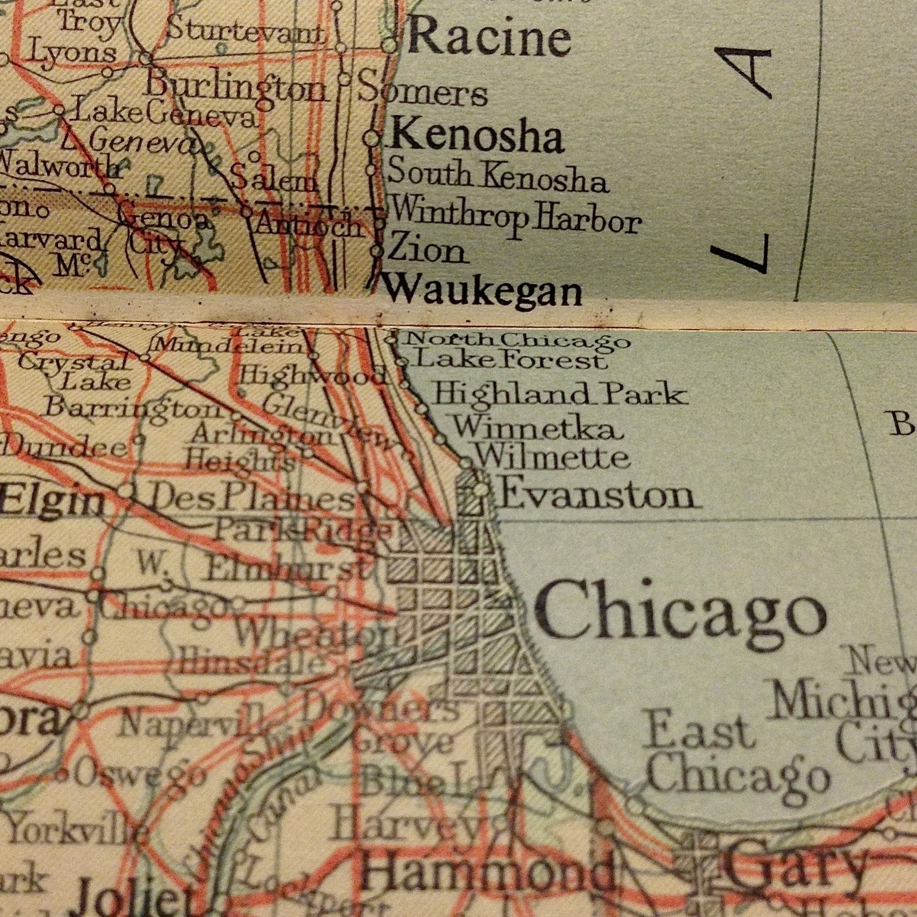 A vintage paper map showing the greater Chicagoland area.